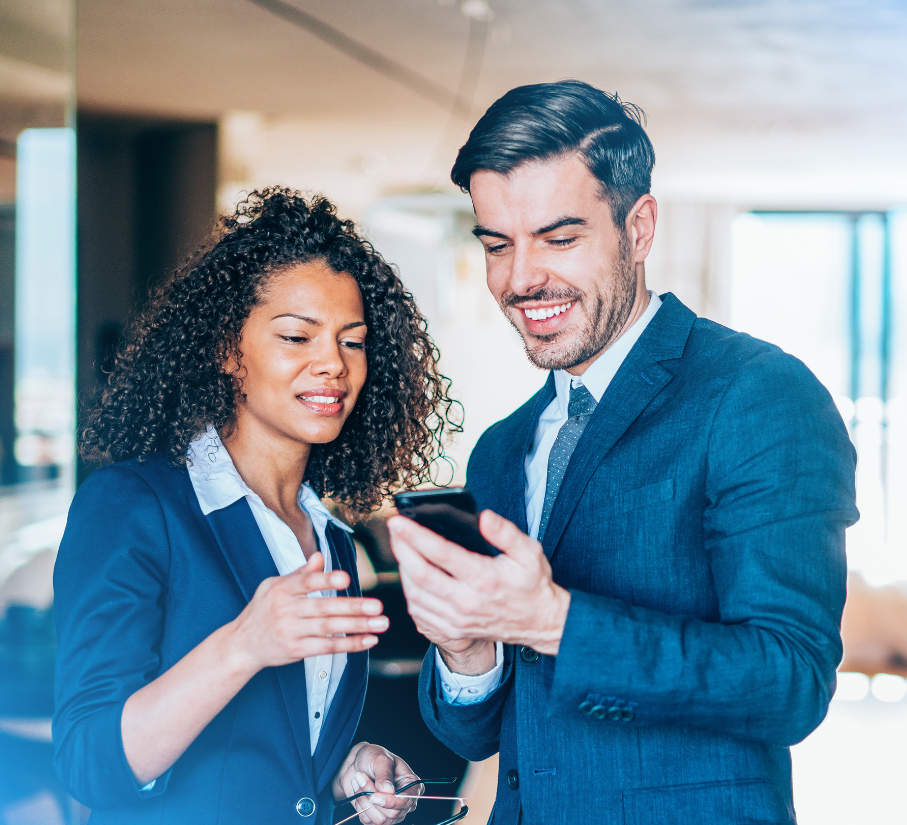 Colleagues reviewing NetSuite ERP pricing on a smartphone.